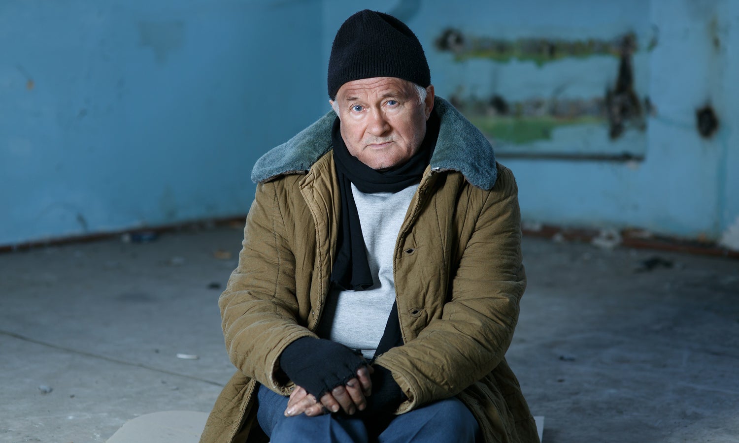 Elderly man sitting